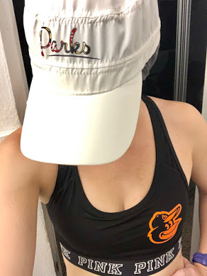 Parks ballcap and Orioles sports bra