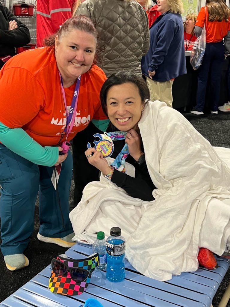 Erika gets the first WDW Marathon medal