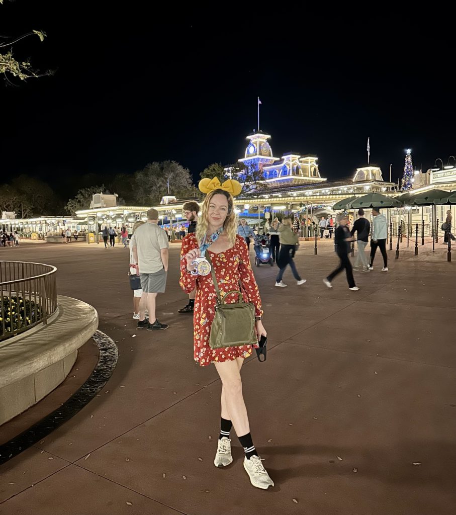 WDW Trip Report - Marathon medal photo shoot by the Magic Kingdom