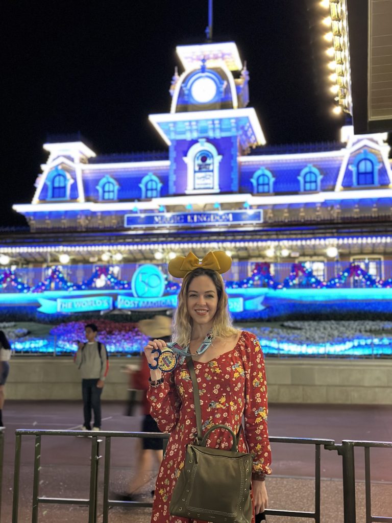 WDW Trip Report - Marathon medal photo shoot by the Magic Kingdom