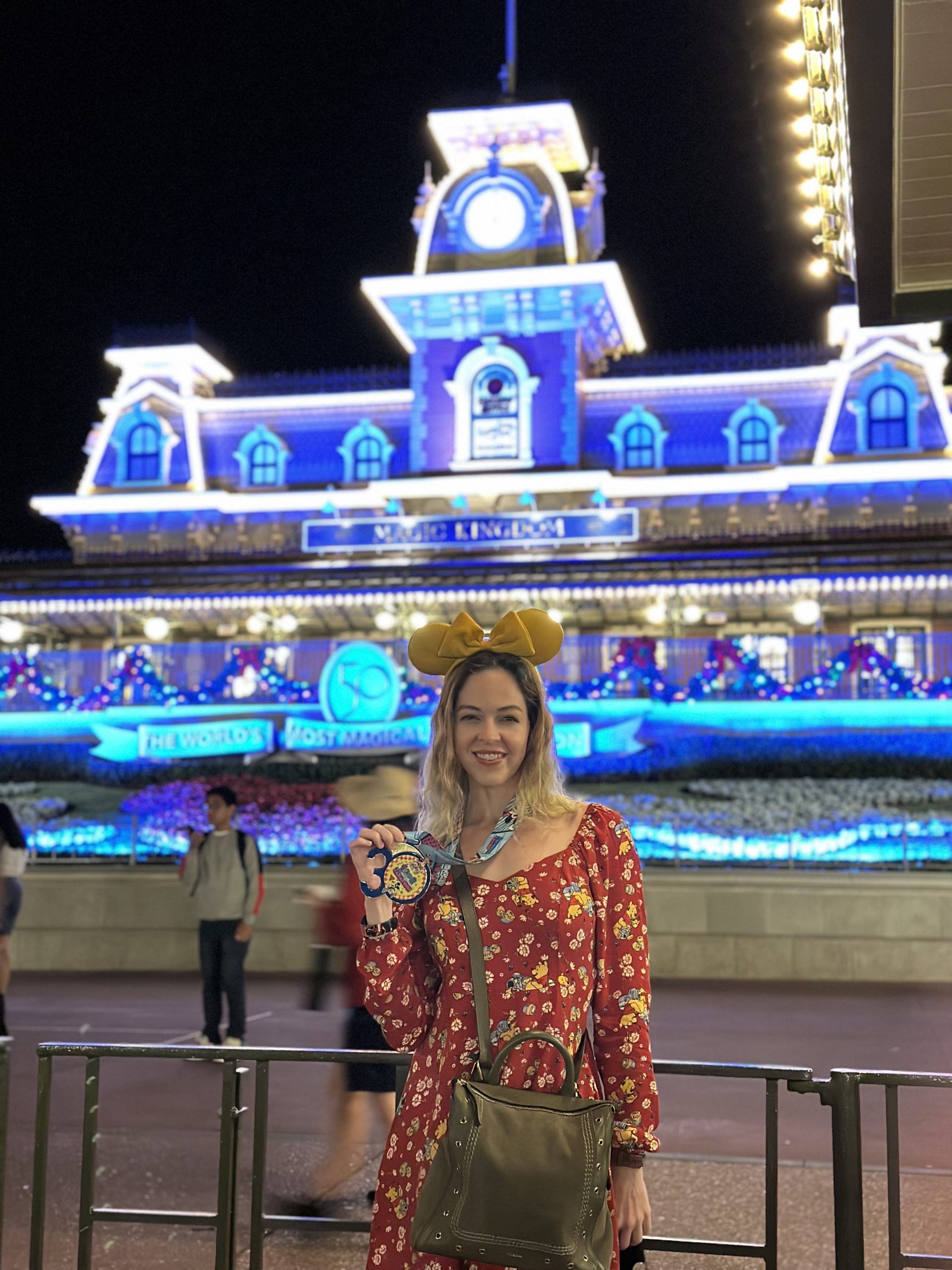 WDW Trip Report - Marathon medal photo shoot by the Magic Kingdom