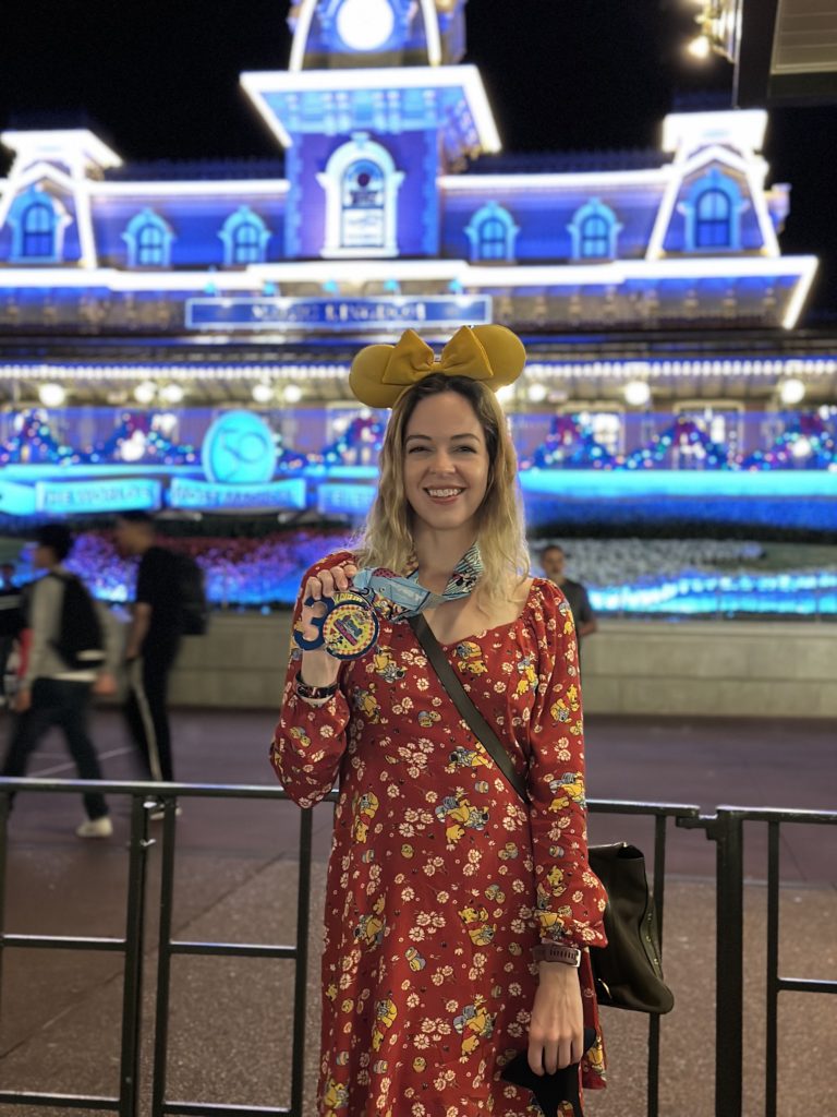 WDW Trip Report - Marathon medal photo shoot by the Magic Kingdom