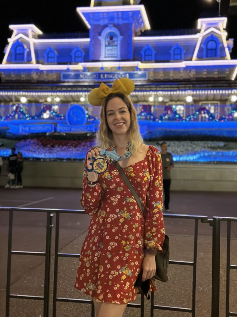 WDW Trip Report - Marathon medal photo shoot by the Magic Kingdom
