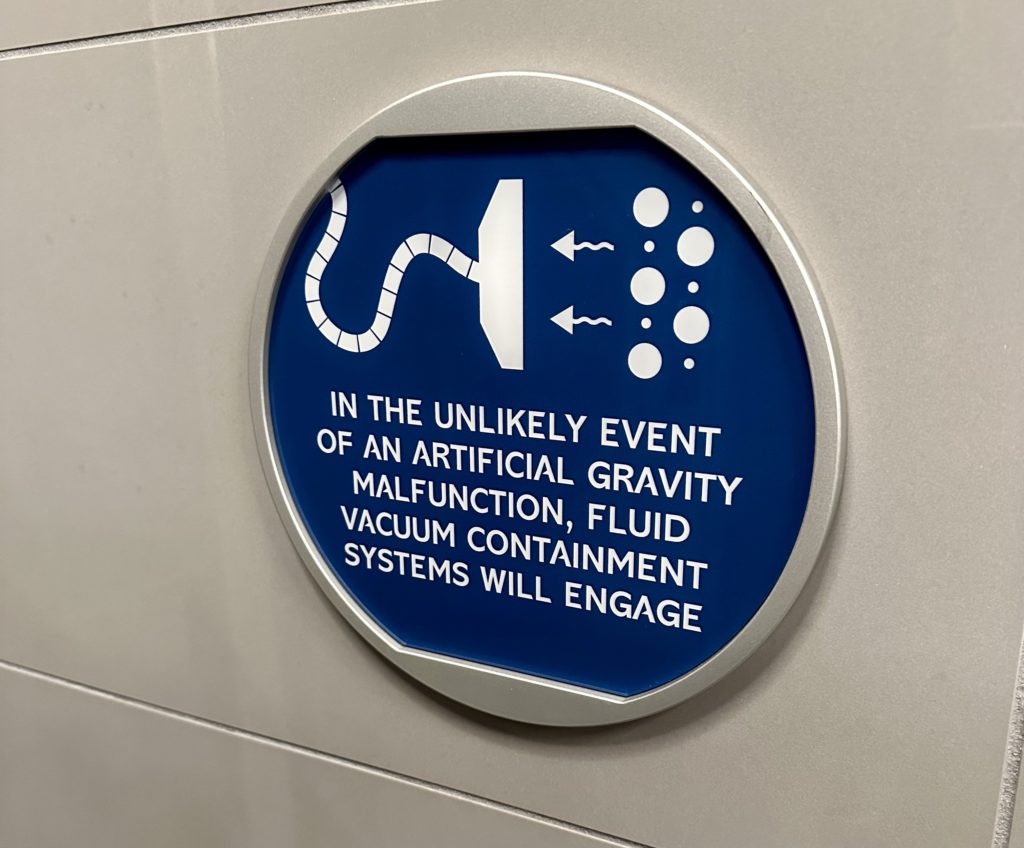 Space 220 humorous bathroom sign