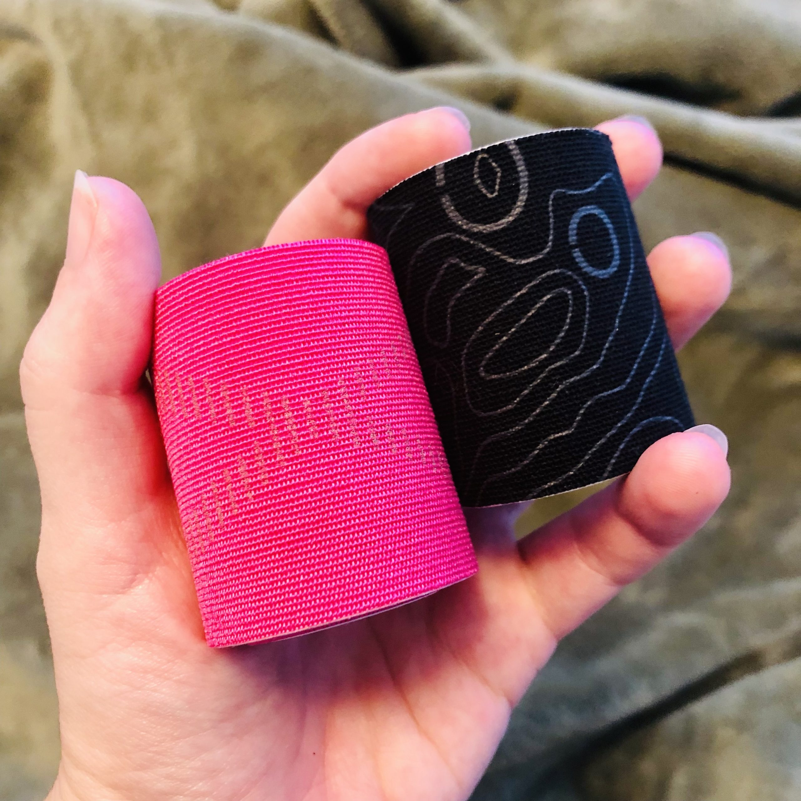 Comparing rolls of kinesio tape