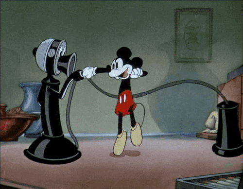 Mickey Mouse jumps rope with the telephone