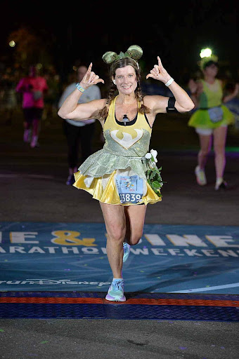2024 Wine & Dine Half Marathon Weekend Kate crosses the finish line