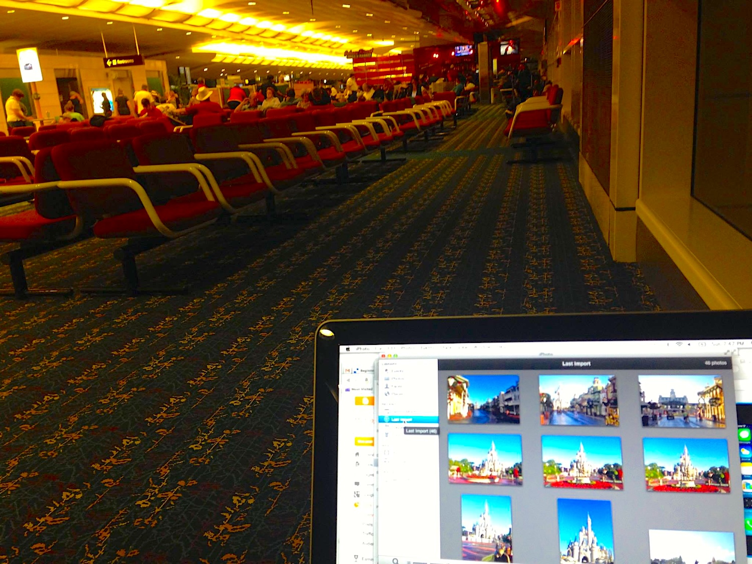 Looking at pictures of WDW on my laptop at MCO