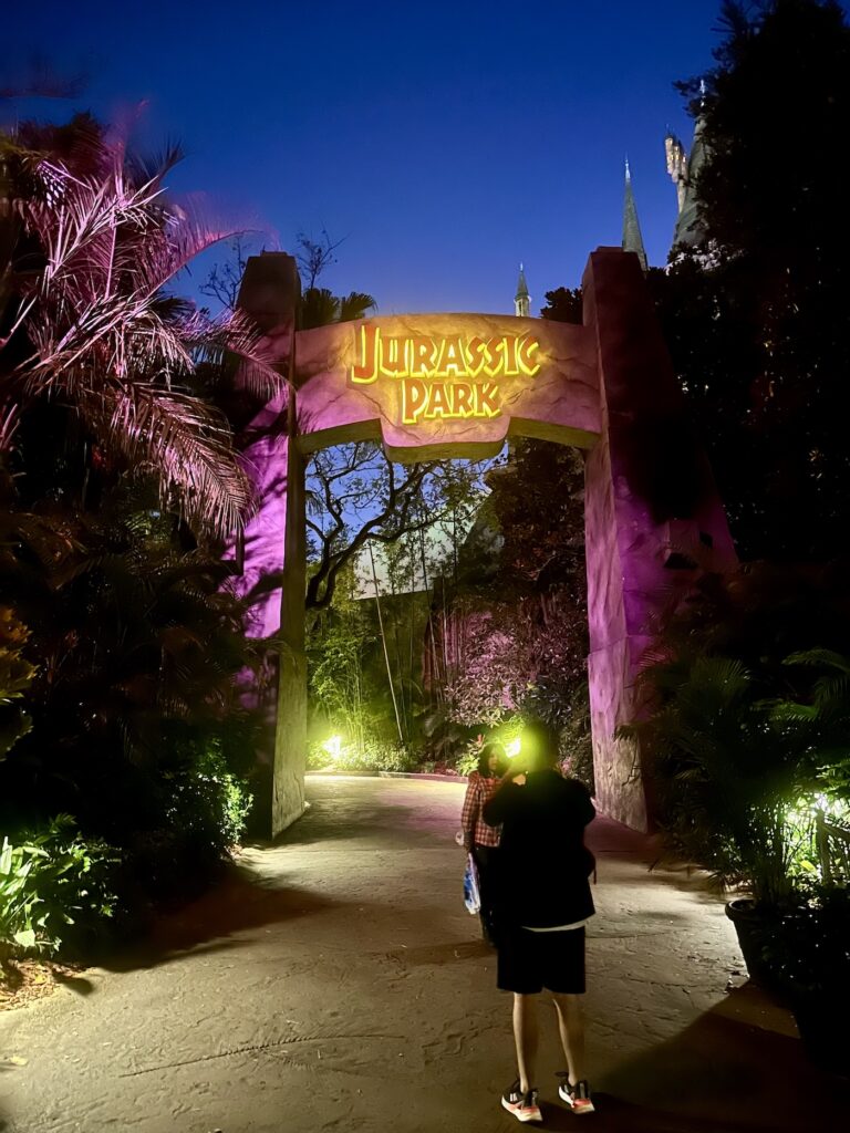 Universal Studios Florida Islands of Adventure Jurassic Park entrance at night